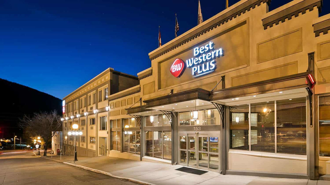 Best Western Plus hotel exterior in Nelson BC lit up at dusk