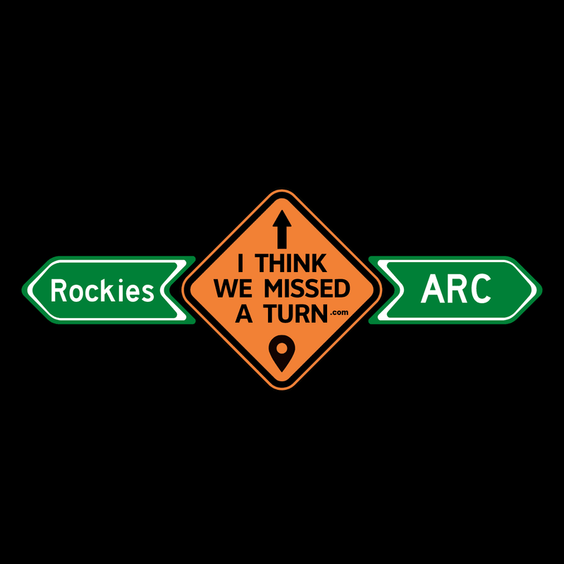 Rockies ARC logo with the orange I Think We Missed a Turn diamond sign between green Rockies and ARC road signs