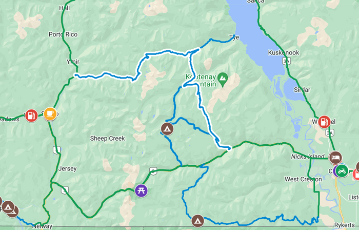 Map of a Kootenay riding route near Sheep Creek and West Creston BC with blue and green tracks and trail markers