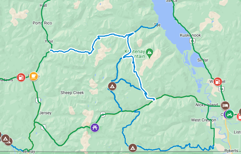 Map of a Kootenay riding route near Sheep Creek and West Creston BC with blue and green tracks and trail markers