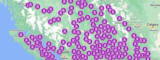 Map of BC dotted with purple fire tower lookout markers from Vancouver Island to Calgary and Banff