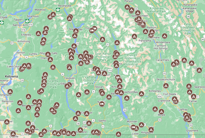 Map of the Kootenays marked with campsite and rec site tent icons for moto camping