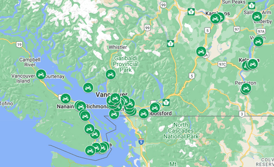 Map of southern BC marked with green motorcycle icons showing motorcycle shop locations from Vancouver Island to Kelowna