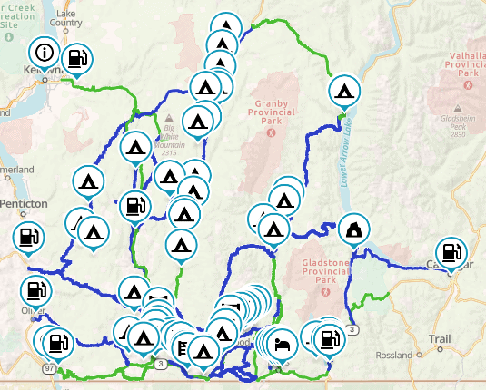 Adventure motorcycle route map of the Kootenay Boundary region with dense campsite and fuel markers