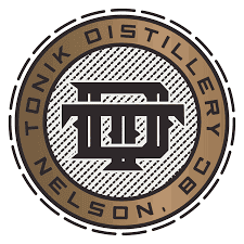 Tonik Distillery Nelson BC round logo with a brown TD monogram crest