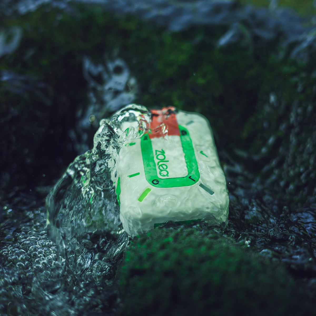 ZOLEO ZL1500 submerged in a creek, IP68 rated